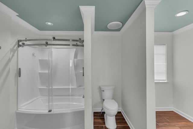 full bath with crown molding, a stall shower, toilet, and wood tiled floor