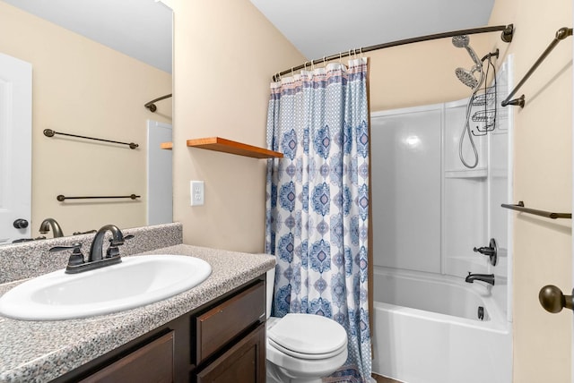 full bathroom with vanity, toilet, and shower / bath combo with shower curtain