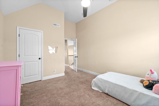 bedroom featuring lofted ceiling, light carpet, and ceiling fan