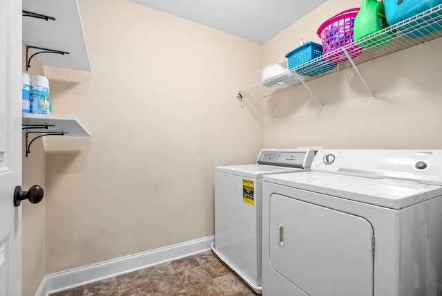 laundry room featuring washing machine and dryer