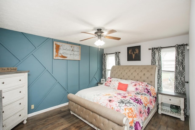 bedroom featuring dark hardwood / wood-style floors and ceiling fan