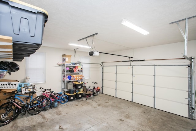 garage featuring a garage door opener