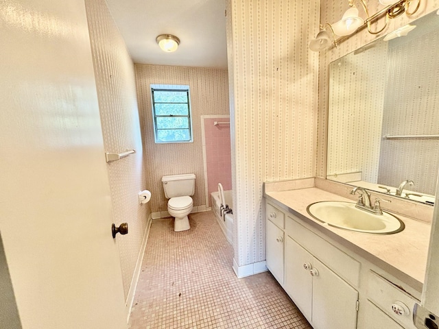 full bathroom featuring tile patterned floors, toilet, tub / shower combination, and vanity