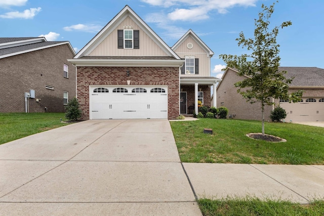 view of front of property featuring a garage and a front lawn