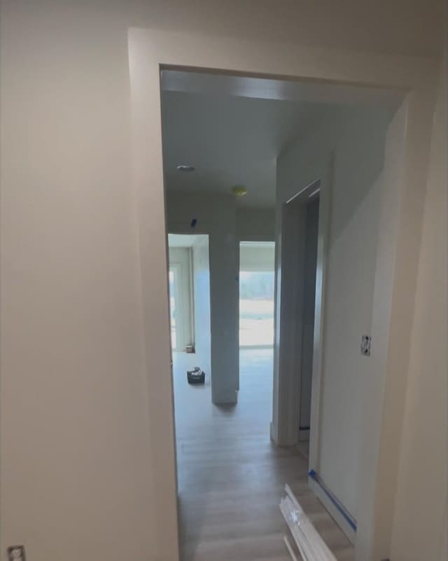 hallway featuring light wood-type flooring