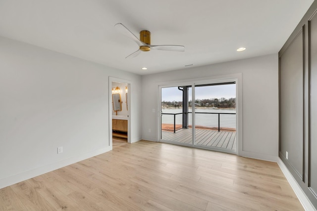 unfurnished room with light wood-type flooring, ceiling fan, and recessed lighting