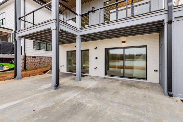 view of patio / terrace with a balcony