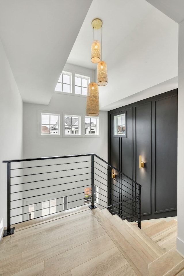 interior space featuring baseboards and wood finished floors