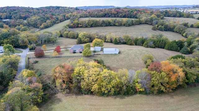 birds eye view of property featuring a rural view