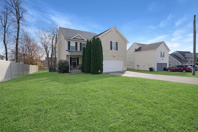 view of front of house featuring a garage and a front yard