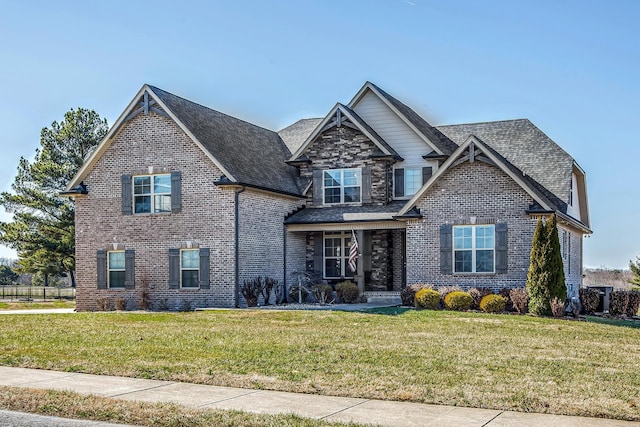 craftsman inspired home with a front yard