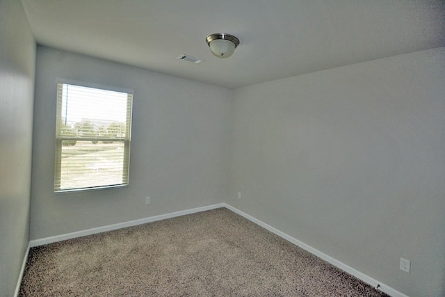 unfurnished room featuring carpet floors