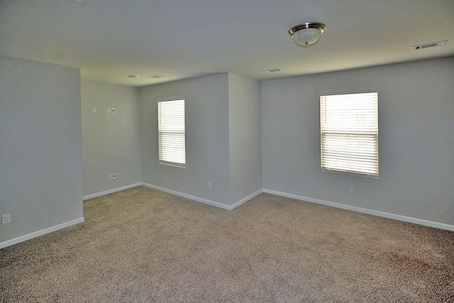 view of carpeted spare room