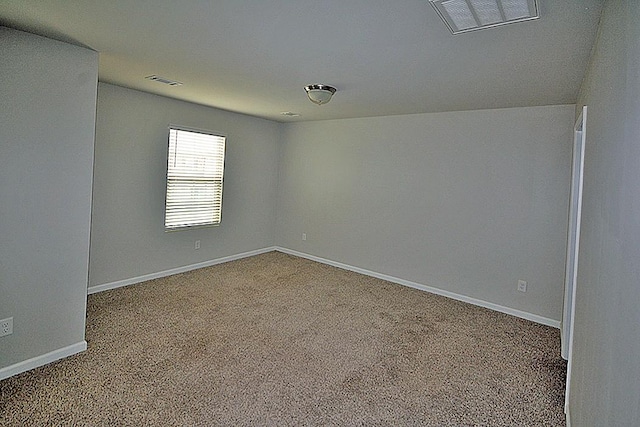 spare room with carpet