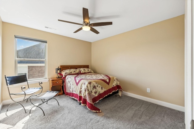 bedroom featuring a ceiling fan, baseboards, visible vents, and carpet flooring