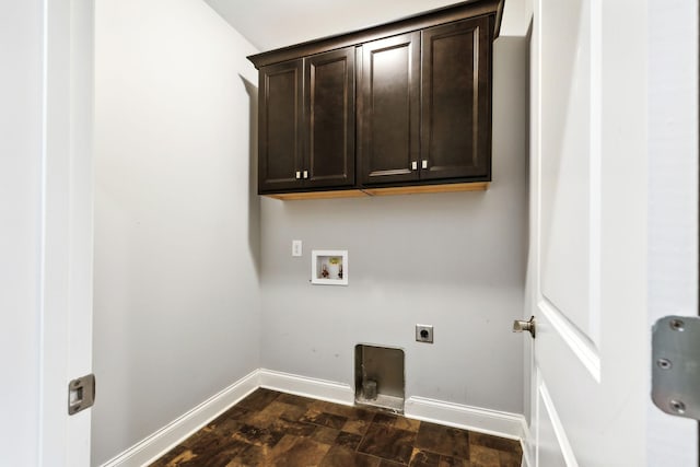 laundry room featuring washer hookup, cabinet space, electric dryer hookup, and baseboards