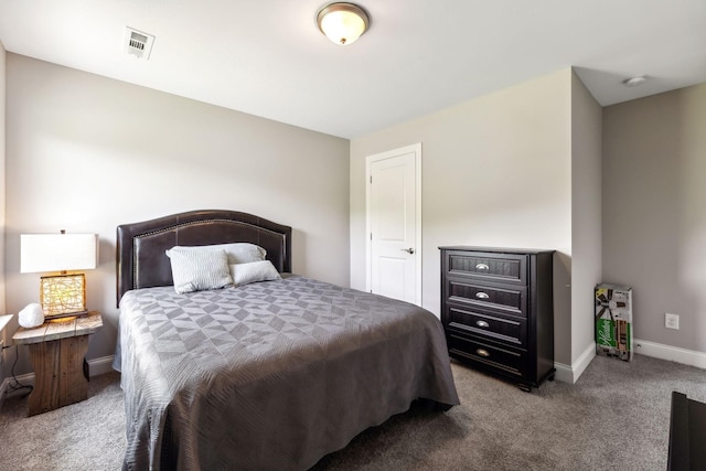 bedroom featuring carpet flooring, visible vents, and baseboards