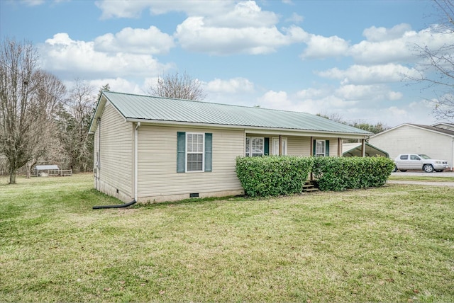 ranch-style home featuring a front yard