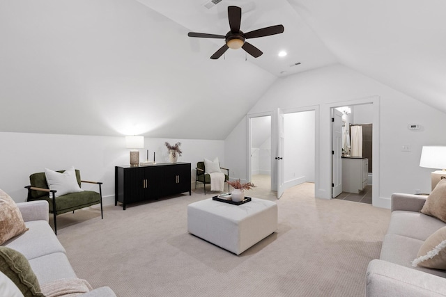 carpeted living room featuring vaulted ceiling and ceiling fan