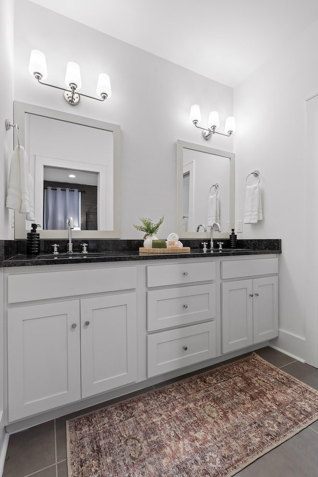 bathroom with vanity and tile patterned floors