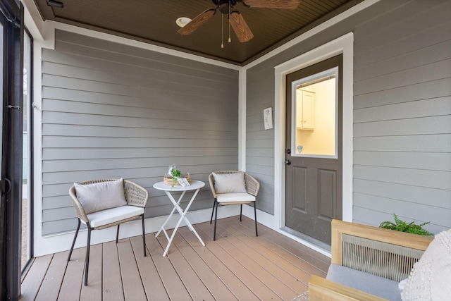 exterior space featuring ceiling fan