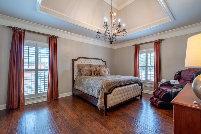 bedroom featuring a notable chandelier, dark wood-type flooring, and ornamental molding