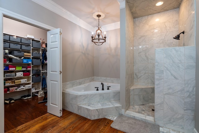 bathroom featuring crown molding, wood-type flooring, independent shower and bath, and a chandelier