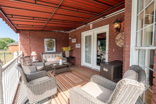 wooden deck featuring an outdoor living space