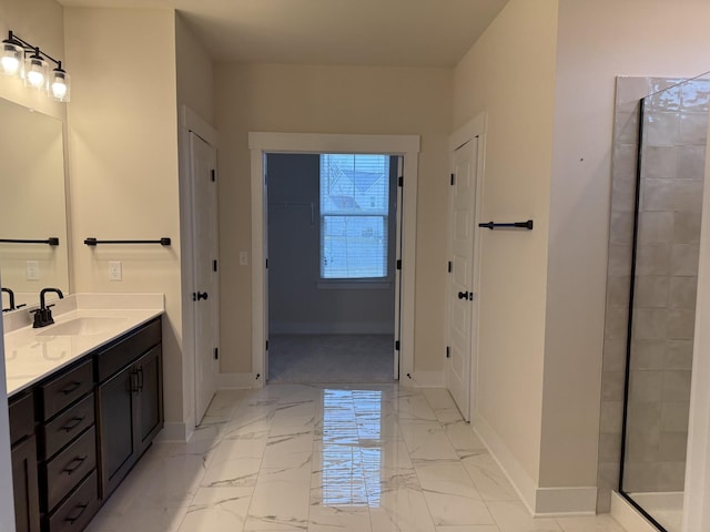 bathroom featuring vanity and a shower