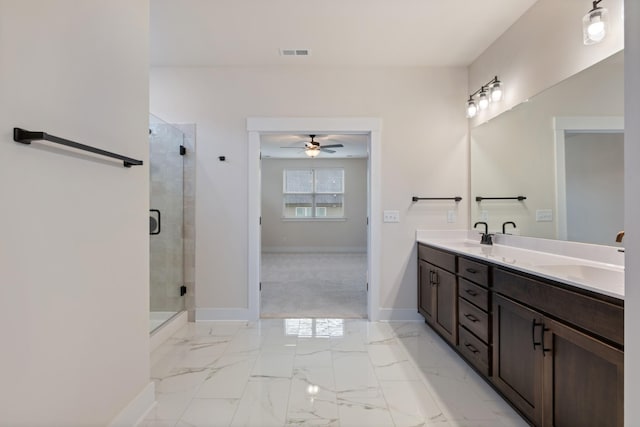 bathroom with vanity, walk in shower, and ceiling fan