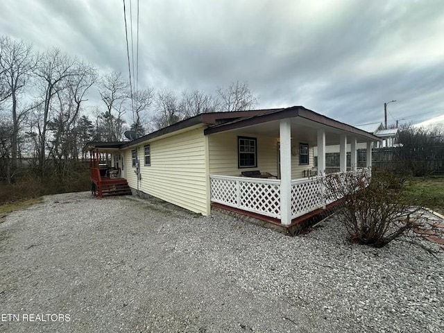 view of home's exterior with a porch