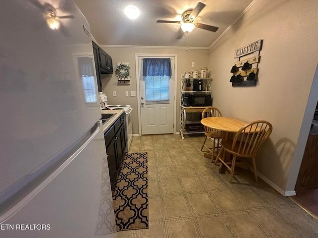 kitchen with white appliances, ornamental molding, and ceiling fan