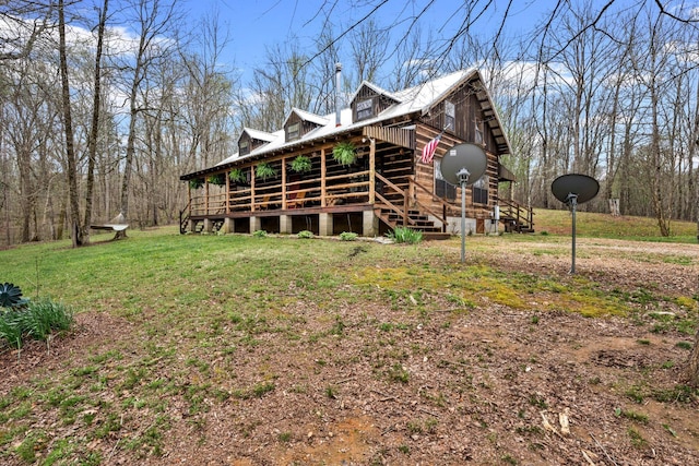 view of home's exterior featuring a yard