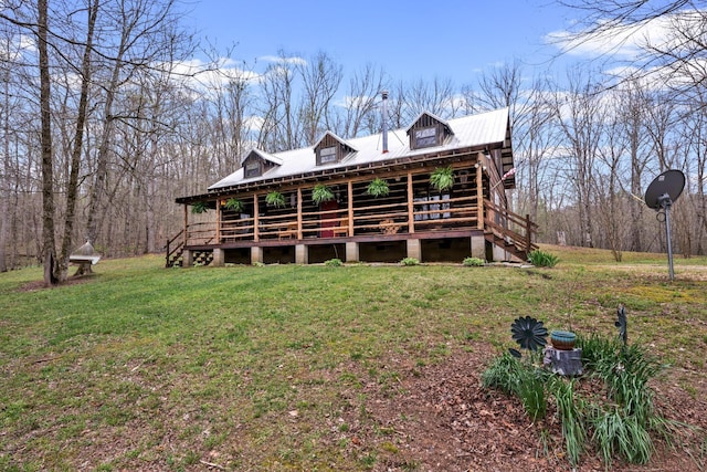 view of front of home featuring a front yard