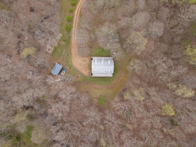 birds eye view of property with a rural view