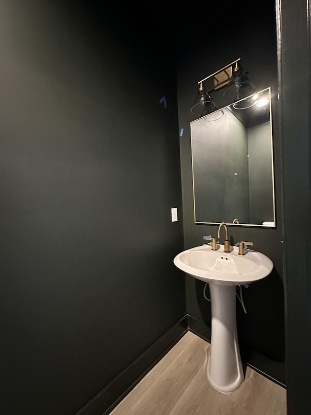 bathroom featuring hardwood / wood-style flooring