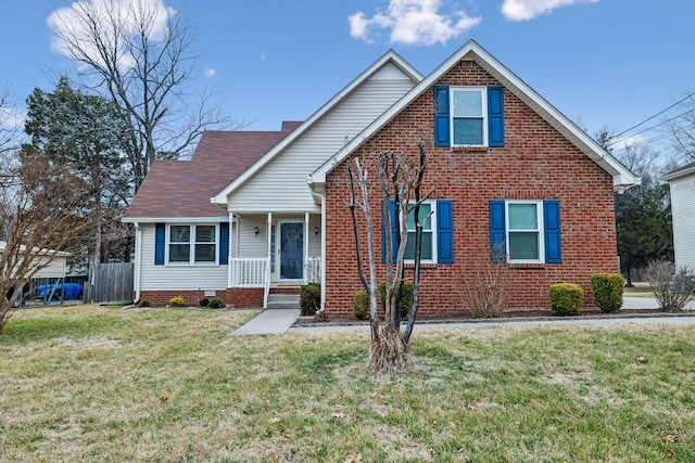 bungalow featuring a front lawn