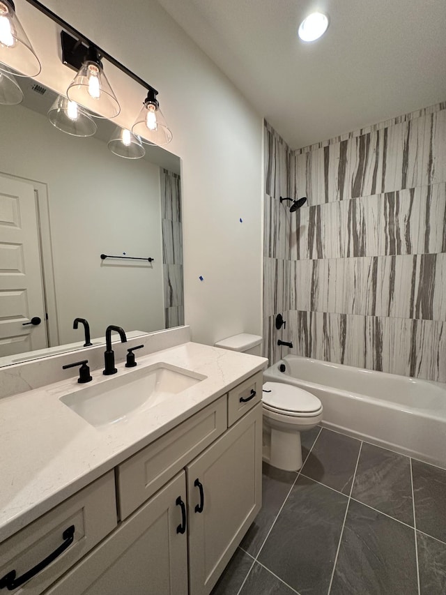 full bathroom with tiled shower / bath combo, vanity, and toilet