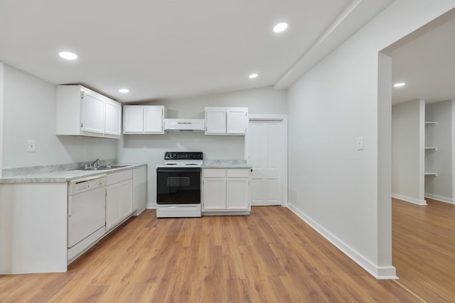 kitchen with white cabinetry, sink, white appliances, and light hardwood / wood-style flooring