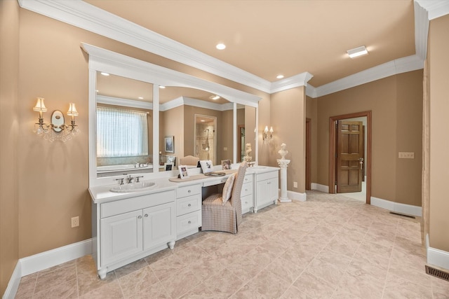 bathroom with vanity, crown molding, and a shower