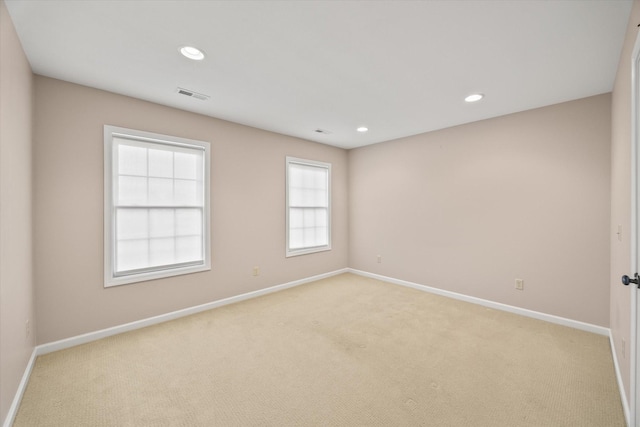 view of carpeted spare room