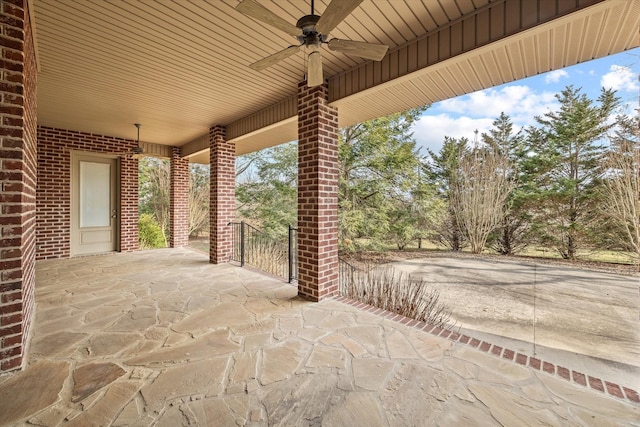 view of patio featuring ceiling fan