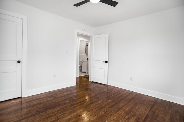 interior space with ceiling fan and dark hardwood / wood-style floors