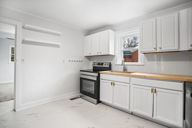 kitchen with sink, stainless steel electric range, wooden counters, white cabinetry, and decorative backsplash