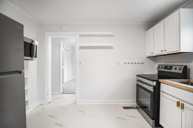 kitchen featuring marble finish floor, open shelves, stainless steel appliances, white cabinetry, and baseboards