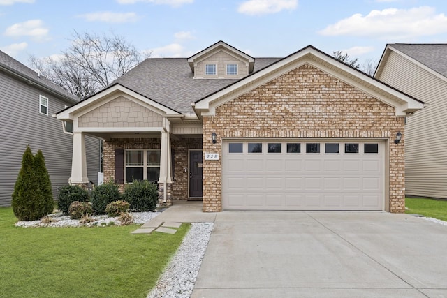 view of front of house featuring a garage, a porch, and a front lawn