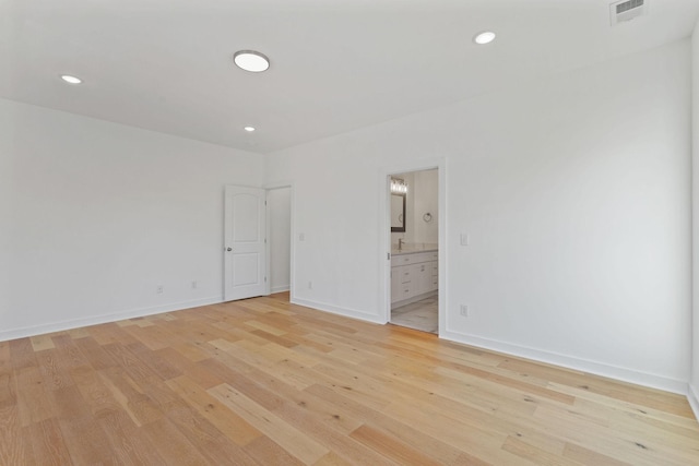 unfurnished room featuring light wood-type flooring