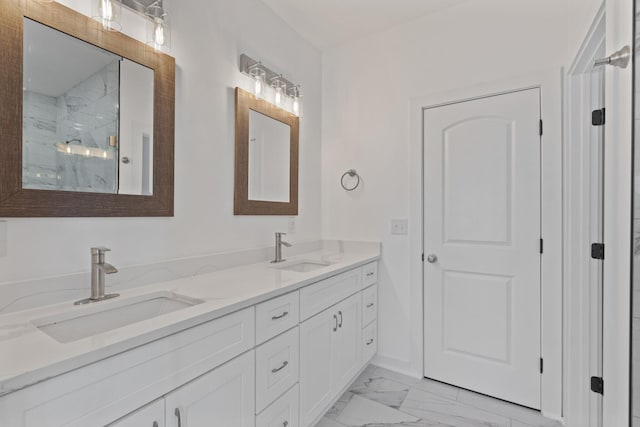 bathroom featuring vanity and a shower