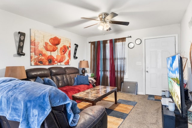 living room featuring ceiling fan and carpet flooring