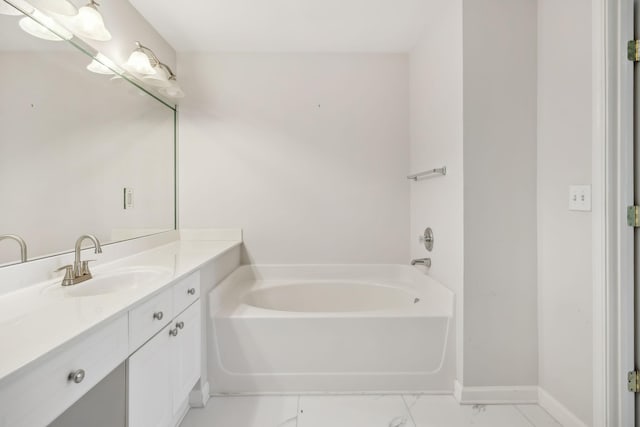 bathroom featuring vanity and a bathing tub